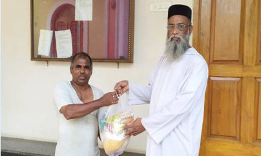 Malankara Church donates groceries to needy in City