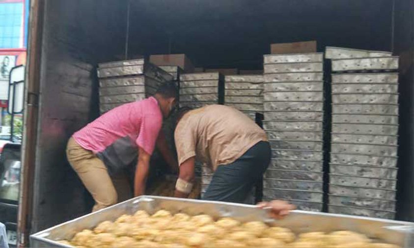 Devotees throng in large numbers for Tirupati laddus in City