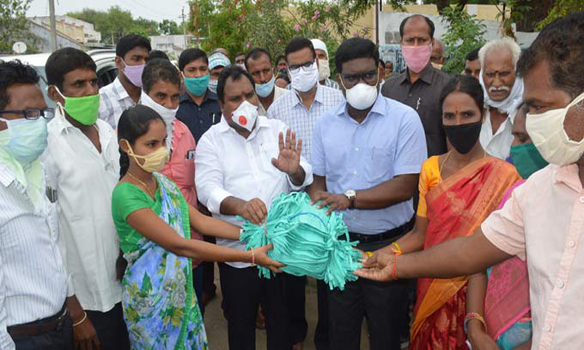 Masks has been distributed to people in Warangal