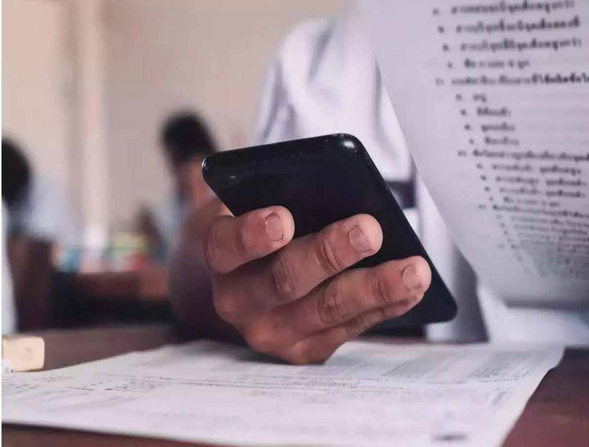 Candidate Caught On Phone While Writing Group-4 Exam
